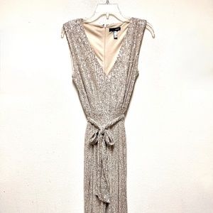 A PERFECT HOLIDAY COCKTAIL WEAR!! BEAUTIFUL AQUA SEQUENCE JUMPSUIT W/ TIE IN!